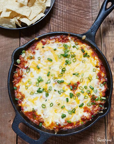 Skillet Nacho Dip: The Ultimate Appetizer - PureWow Skillet Nachos, Nacho Dip, Iron Skillet Recipes, Cast Iron Skillet Recipes, Superbowl Snacks, Nachos Recipe, Skillet Meals, Cast Iron Cooking, Snacks Für Party