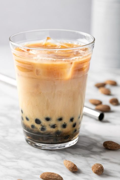 This refreshing almond milk tea is an easy & healthy homemade bubble tea recipe. Save money and time making this copycat drink at home! Homemade Bubble Tea, Almond Milk Tea, Boba Tea Recipe, Boba Recipe, Bubble Tea Flavors, Bubble Tea Straws, Bubble Tea Recipe, Milk Tea Recipes, Drink At Home