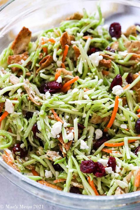 Broccoli slaw: the perfect summer side dish recipe! This easy broccoli salad is satisfying, nutritious, and pleases even picky eaters! With a homemade vinaigrette, this broccoli slaw recipe is mayo-free and super delicious! Try out this dinner side dish today! Vinegar Broccoli Slaw Recipe, Broccoli Slaw Recipes Mexican, Summer Broccoli Side Dish, Broccoli Slaw Ideas, Broccoli Slaw Recipes Stir Fry Chicken, Brocoli Slaw Salad Recipes, Broccoli Cole Slaw Recipes, Shredded Broccoli Salad Recipe, Recipes With Broccoli Slaw