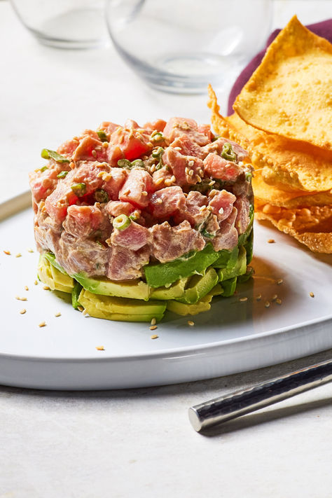 Simple yet sophisticated: Tuna tartare atop creamy avocado - a breeze to whip up! It's creamy, light, and delicious, perfect for summer gatherings.  #TunaTartare #SummerEats #WessonCanolaOil Tuna Tartare Avocado, Tuna Tartare Recipe, Tuna Tartare, Tuna Avocado, Food Eating, Summer Gathering, Canola Oil, New Recipes, Avocado