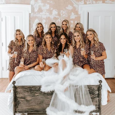 Bridal party in animal-print pajama sets, bride wearing detailed flowy white robe {ASHLYN CATHEY} Bridesmaid Get Ready Outfit, Bridal Party Getting Ready, Wedding Night Lingerie, Bridal Preparation, Bridal Party Outfit, Bachelorette Party Planning, Bridesmaid Getting Ready, Bridal Bachelorette Party, Wedding Picture Poses