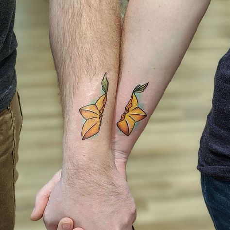 Cute matching couple tattoos of paopu fruit. Tattoos done by Emi Lee Hollinger. #paopufruittattoo #paopufruit #emileehollingertattoo #iowatattoo #tagtheqc #coupletattoos #davenportia #midwesttattoos Matching Kingdom Hearts Tattoos, Kingdom Hearts Couple Tattoo, Kingdom Hearts Paopu Fruit Tattoo, Video Game Couple Tattoos, Paopu Fruit Tattoo, Video Game Matching Tattoos, Paopu Fruit Kingdom Hearts, Zelda Couple Tattoo, Gaming Couple Tattoos