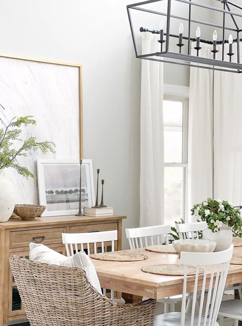 Dining room decor - coastal home - coastal style room - dining room inspo - dining furniture - rattan furniture - coastal home decor, coastal home inspiration, coastal dining room design, coastal dining room inspo, coastal home ideas, beach house decor, lake house decor, coastal vibes, coastal furniture, beach house furniture, white dining room chairs, wood dining table, coastal farmhouse dining room inspiration ideas Dining Room With Wicker Chairs, Dining Table Coastal Style, Coastal Living Dining Room Combo, Coastal Rectangular Dining Table, Coastal Kitchen And Dining Room, White Coastal Furniture, Dining Room Table With White Chairs, Dining Chairs Modern Farmhouse, White Kitchen Dining Table Ideas