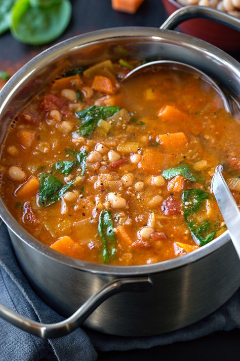 Rich and brothy, this mildly spicy chorizo soup loaded with lots of fresh vegetables and smoky spices will warm you from within. | thecozyapron.com #chorizosoup #chorizosouprecipes #chorizosouplowcarb Chirozo Recipes, Chorizo Soup Recipes, Soup With Chorizo, Portuguese Soup, Chorizo Soup, Chorizo Recipes, Sweet Potato Spinach, Keto Soup, White Bean Soup