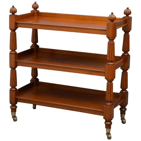 For Sale on 1stDibs - Sn3972 fine quality and very elegant Victorian, figured mahogany three-tier stand / dumbwaiter, having raised gallery to each shelf and turned and reeded Victorian Bookcases, Three Tier Stand, Black And White Tiles Bathroom, Mahogany Bookcase, Walnut Shelves, Black Sideboard, Trellis Design, Tiered Stand, Glazed Door