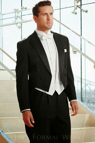 Long black tail coat with white tie, white wing collar dress shirt and vest. White Tuxedo Wedding, Black Tuxedo Wedding, Tuxedo Styles, Groomsmen Tuxedos, White Tux, Black Suit Wedding, Black And White Tuxedo, White Jeans Men, Tail Dress