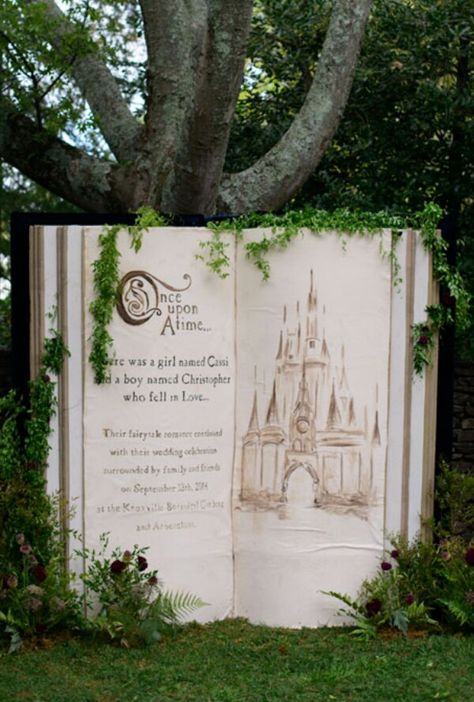 A giant Fairy tale book as decoration Book Backdrop, Fairytale Wedding Theme, Majlis Perkahwinan, Enchanted Forest Wedding, Fairy Tale Books, Wedding Photo Booth, Fairy Tale Wedding, Green Wedding Shoes, Disney Wedding