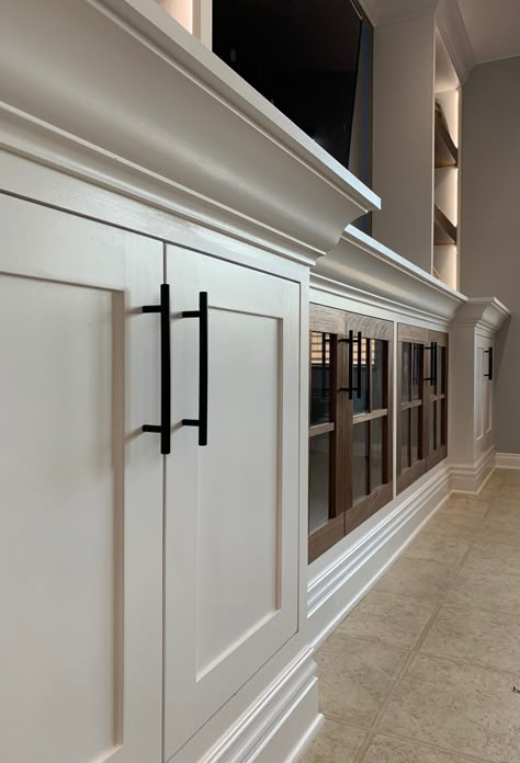 Built In Tv Wall Unit With Glass Doors, Built In Entertainment Center High Ceiling, High Ceiling Entertainment Center, Hampton Tv Wall, Vaulted Ceiling Entertainment Center, Wall Length Entertainment Center, Big Tv Wall, Cabinet Hardware Entertainment Center, Tv Shelving Unit