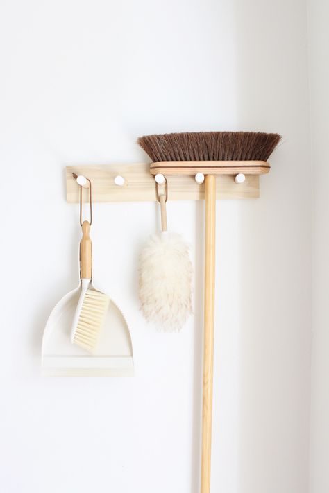 Broom Storage Wall, Laundry Organization Aesthetic, Clean Laundry Room Aesthetic, Broom Hanger Ideas, Farmhouse Broom Holder, Broom Hanging Ideas, Laundry Room And Cleaning Storage, Hanging Brooms And Mops Ideas, Laundry Products Organization