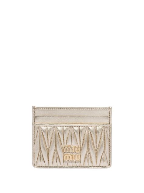 Find MIU MIU Matelassé Nappa Leather Card Holder on Editorialist. matelassé nappa leather card holder from MIU MIU featuring gold-tone, nappa leather, metallic finish, matelassé detailing, gold-tone logo lettering and card slots. Miu Miu Wallet, Spring Things, Inside My Bag, Miu Miu Bag, Woman Card, Cute Wallets, Leather Card Holder, Card Holder Wallet, Cute Bags