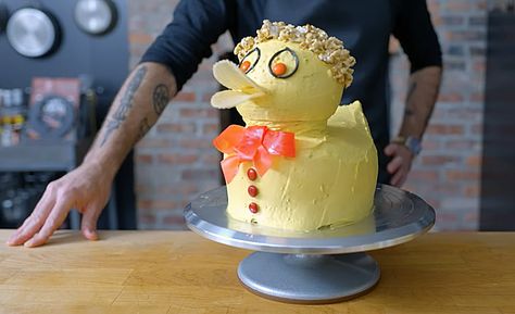 How to bake a Bluey Duck Cake | The Kid Should See This Diy Duck Cake Bluey, How To Make Bluey Duck Cake, Bluey Duck Cake Ideas, Bluey Birthday Duck Cake, Bluey Duck Cake Tutorial, Bluey Pavlova, Duck Cake Bluey Birthday, Bluey Duck Cake, Bluey Cake Pops