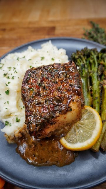 Kay on Instagram: "HOT HONEY WHITE FISH IN A GARLIC HERB BUTTER SAUCE AND BROCCOLI 💣🌋🏆🤯🧨🚦🚀🤩🥦 💃🏽💥🥳. Tastiest easy juicy tender Cod fillets marinated in a superb marinate then grilled to perfection. Then cooked in a TO DIE FOR hot honey garlic herb butter with broccoli. The fish was full of fLAVA and incredibly tasty. Quick weeknight meals!! THE BEST WHITE FISH RECIPE!! Using @gracefoodsuk seasonings 🔥🔥🔥 . . DM FOR MORE INFO TO GET MY DAILY RECIPES. . . #seafood #fish #foodporn #fo Spicy White Fish Recipes, Hot Honey White Fish In A Garlic Herb Butter Sauce, Honey White Fish In A Garlic Herb Butter Sauce, Baked Ginger Soy Cod, Garlic Herb Tilapia, Butter Fish Recipe, Zesty Lemon Butter Fish Fillet, Seafood Sandwiches, White Fish Recipes