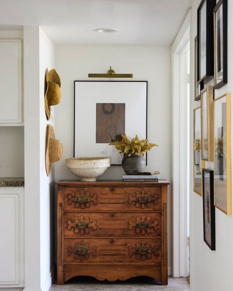 The 2021 Interior Design Trends to Get Excited About! - Chris Loves Julia Holistic Habitat Decor, Antique Gallery Wall Hallway, Artwork Above Dresser, Dressers In Living Room Ideas, Modern Traditional Living Room Decor Ideas, Entryway Dresser Decor, Chest In Living Room, Antique Interior Design Vintage Modern, Modern Antique Living Room