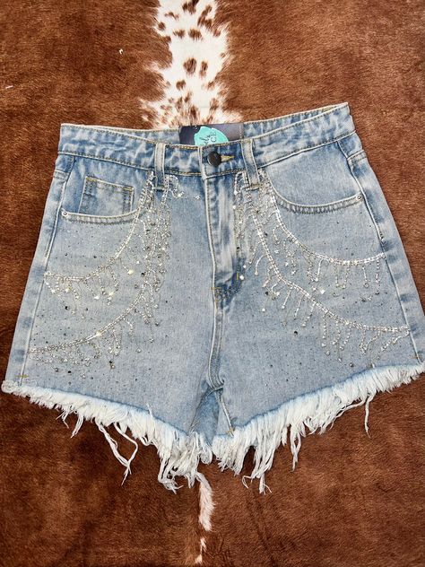 Casual Cutoff Shorts With Rhinestone Fringe, Spring Cutoff Jean Shorts With Rhinestone Fringe, Summer Cutoff Jean Shorts With Rhinestones, Cutoff Jean Shorts With Rhinestones For Summer, Trendy Jean Shorts With Rhinestone Fringe, Casual Cutoff Bottoms With Rhinestone Fringe, Rhinestone Fringe Denim Jean Shorts For Spring, Denim Shorts With Rhinestones, Summer Jean Shorts With Rhinestone Fringe