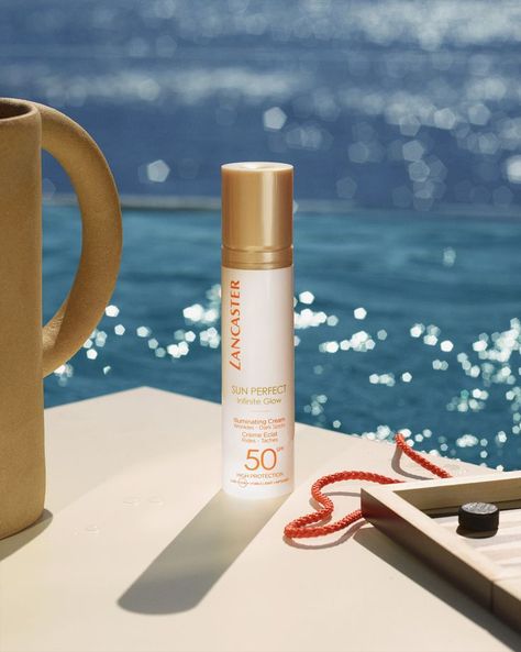 Meet Lancaster's best-selling suncare & skincare hybrid: SUN PERFECT Illuminating Cream SPF50, for an instant natural glow with the best anti-aging technology. Wrinkles and dark spots are reduced, skin is protected, your natural glow is enhanced with our formula’s instant illuminating effect. #LuminousSkin #AntiAgingTips #AntiWrinkles #InnovativeSkincare #WearSPF #SPFeveryday #GoldenGlow #YouthBoosting #ProtectYourSkin #UVprotection #SkinYouth #BestSPFForFace Dairy Free Breastfeeding, Homemade Facial Mask, Glowing Background, Suncare, Luminous Skin, Cosmetic Design, Tanning Oil, Wrinkled Skin, Beauty Shoot