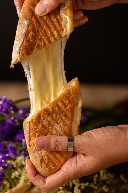 Disparo vertical de las manos de una per... | Free Photo #Freepik #freephoto #comida #mano #persona #pan Natural Cheese, Hands Holding, Cheese Sandwich, Grilled Cheese Sandwich, Cheese Sandwiches, Grilled Cheese, Free Photo, Free Photos, Two Pieces