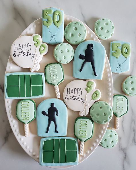 Pickleball Birthday Cookies 💙💚 Happy 50th Birthday Colleen • Decided to change my posting style a bit...I've been so busy these last 2 months, and I'm so grateful for it, but that means I can't film everything I do anymore. I'll be posting behind the scenes, though, as I go along... still have a lot to share with you 🥰 • #cookie #cookies #decoratedcookies #cookiesofinstagram #cookiehack #cookietip #cookiedecorating #satisfying #satisfyingreel #cookier #newcolors #thisweekscolors #jdsugarcooki... Pickle Ball Cookies, Pickleball Cookies Decorated, Pickleball Cookies, Pickleball Birthday, Ball Event, Sports Cookies, Cookie Hacks, Ball Birthday, Pickle Ball