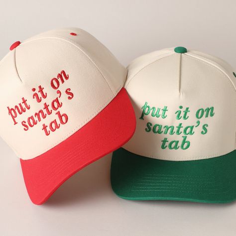 Put It On Santa's Tab Text Embroidery Two-Tone Canvas Trucker Hat, Stylish Casual 100% Cotton Outdoor Caps, Hat for Everyday Fashion. It's a cool classic designed to add personal shade wherever you go! Perfect for dog walking, the beach, the gym, the pool, and everyday wear! It's fully adjustable and easy to style! ** 🧢 Detail & Features 🧢 ** - "put it on sant's tab" Text Embroidery  - 5 Panel Canvas Baseball Cap - 100% Cotton - Adjustable Buckle Closure - Embroidered In USA *One Size Fits All - Adjustable Strap Makes Fit Comfortable.* Christmas Baseball Cap, Sublimation Hat Ideas, Diy Trucker Hat, Embroidery Business, Hat Bar, Text Embroidery, Custom Trucker Hats, Outdoor Cap, Vinyl Ideas