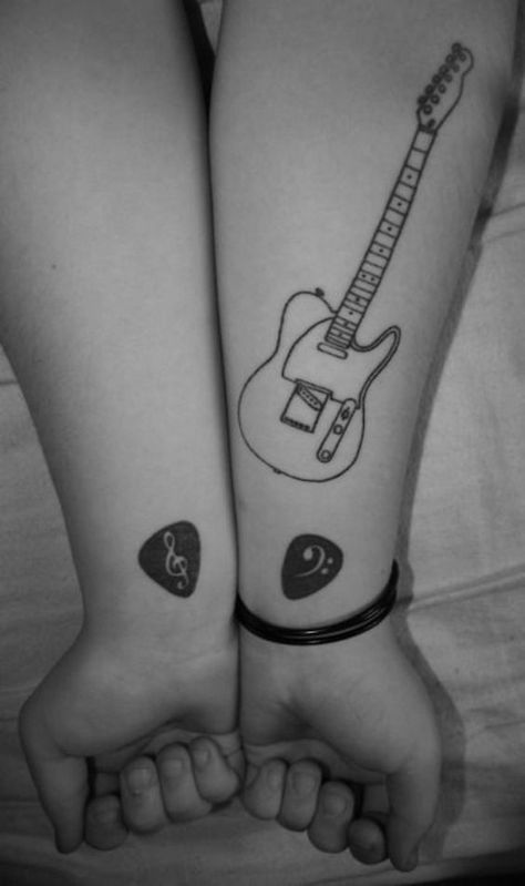 Matching guitar pick tattoos with a guitar tattoo on the forearm | www.otzi.app Pick Tattoo, Music Guitar Tattoo, Tattoo Guitar, Tattoos That Mean Something, Guitar Tattoo Design, Guitar Tattoo, Music Tattoo Designs, Tattoo Zeichnungen, Music Tattoo