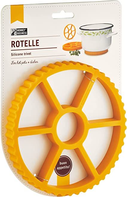 Fun Rotelle-Shaped Silicone Trivet / Hot Pads for Kitchen from a Series of Pasta-Inspired Kitchen Gadgets | Cool Hot Pads to Protect The Countertop | Original Kitchen Accessories | by Monkey Business Fridge Deodorizer, Kitchen Surface, Silicone Pot Holders, Silicone Trivet, Kitchen Surfaces, Hot Dishes, Kitchen Must Haves, Pasta Shapes, Monkey Business