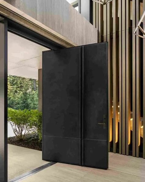 Make an Entrance with a Stunning Pivot Door 🚪✨ Bold, elegant, and functional—pivot doors create a seamless flow while making a statement. The perfect blend of design and impact for any modern home. Available at @allmoderndoors. #PivotDoor #ModernDesign #CurbAppeal #AllModernDoors #InteriorStyle #ArchitecturalDesign #HomeImprovement #DesignMatters Large Pivot Front Door, Florida Homes Exterior, Dream House Modern, Modern Mountain House, Modern Entry Door, Pivot Door, Black Front Doors, Modern Front Door, House Front Door