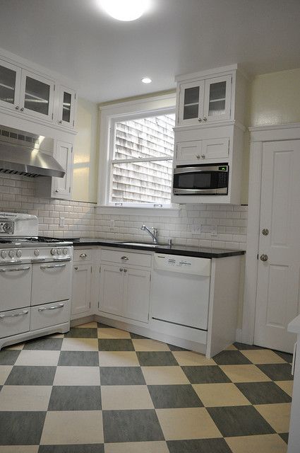 marmoleum floor - diagonal checks. Not sure about the off-white tiles with the white cabinets Marmoleum Kitchen, Marmoleum Floors, Bungalow Kitchen, Galley Kitchen Remodel, Kitchen Remodel Cost, Farmhouse Kitchen Remodel, White Kitchen Remodeling, Small Kitchen Remodel, Kitchen Remodel Design