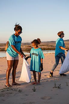 Volunteer Community Beach Clean Group Photo | Stocksy United Beach Community, Clean Beach, Group Photo, Photo Download, Sand Dunes, Group Photos, Model Release, Us Images, Royalty Free Stock Photos