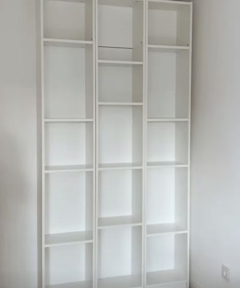 This IKEA BILLY hack is a gallery-inspired corner in a home | Livingetc Ikea Billy 40cm, Narrow Billy Bookcase Hack, Ikea Hack Billy Bookcase, Ikea Billy Corner Bookcase, Besta Billy Combination, Gnedby Ikea Ideas, Billy Ikea Bookcase, Vihals Ikea Hacks, Ikea Billy Hack Ideas