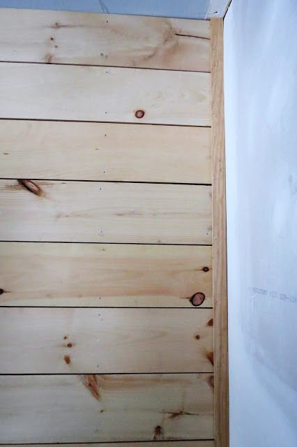 DIY Shiplap walls, farmhouse flair with wood planked walls to mimic the shiplap walls in our real life fixer upper. we purchased a gallon of paint to paint, 3 paint stirers and 12 pieces of 1x8x8. (That is 1 inch thick by 8 inch wide by 8 feet long.) We also picked up two pieces of lattice, 2" wide by 8 feet long and happily traipsed home.