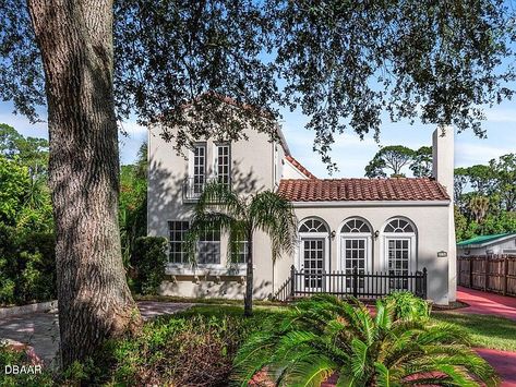 Spanish Villa in Daytona Beach, Florida. Has a guest house. Circa 1930. $259,900 - The Old House Life House With Guest House, Spanish Style Villa, Living Room Outside, Ornate Fireplace, Arch Entryway, Arch Doorway, Galley Style Kitchen, Spanish Villa, Separating Rooms