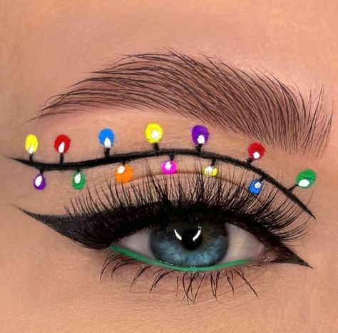 New Years Eyeliner Looks, Christmas Lights Eyeliner, Christmas Tree Eye Makeup, Christmas Eye Shadow Looks, Christmas Lights Makeup Looks, Christmas Light Eyeliner, Christmas Light Makeup, Grinch Inspired Makeup, Christmas Eye Looks