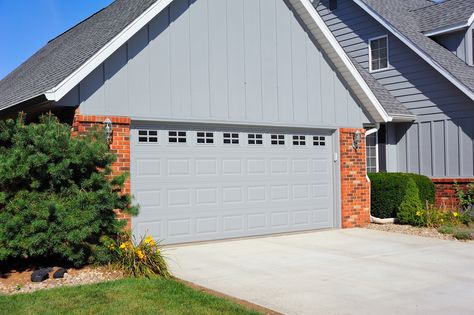 Steel garage door with windows in grey from C.H.I. Overhead Doors Chi Garage Doors, Garage Door With Windows, Steel Garage Door, Garage Door Panels, Garage Door Windows, Steel Garage Doors, Residential Garage Doors, Residential Garage, Steel Garage