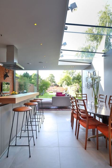 Glazed sidefill extension to Victorian townhouse Raised Lawn, Victorian Townhouse, Patio Tiles, Victorian Home, Seamless Transition, Kitchen Extension, Kitchen Doors, Luxury Kitchens, Kitchen Space