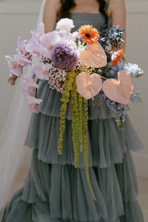 This funky bouquet matches perfectly with the couples colorful ceremony! Air Force Wedding, Unique Bridal Bouquets, Colorful Bridal Bouquet, Fairytale Gown, Unique Bouquet, Colorful Bouquet, Blue Wedding Dresses, Wedding Aisle, Fairytale Wedding