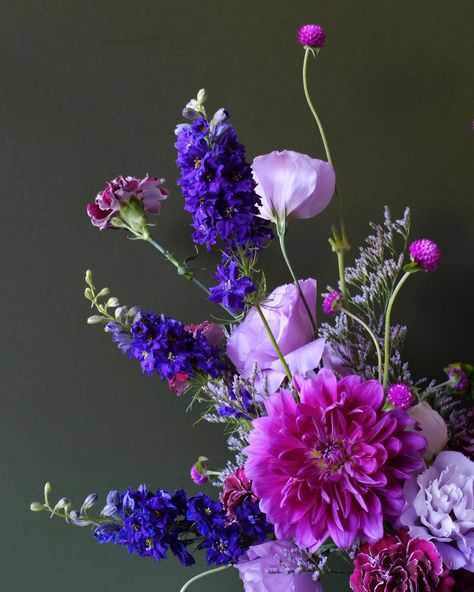 Monochromatic purple arrangement. We wanted to go for a more classy and elegant vibe this time around to fit the vibe at @carreracafe! This arrangement is currently on display there alongside our poem, “Small chances.” Stop by and check them out after your selfie at the pink wall. 🤗 Thank you so much, @carreracafe for displaying our work in your beautiful space! noelan+mabel blooms & poems. Purple Flowers Arrangements, Pink And Purple Flower Arrangements, Abraxos Tattoo, Purple Flower Arrangements, Monochromatic Aesthetic, Small Flower Arrangements, Purple Vase, Classy And Elegant, Pink And Purple Flowers