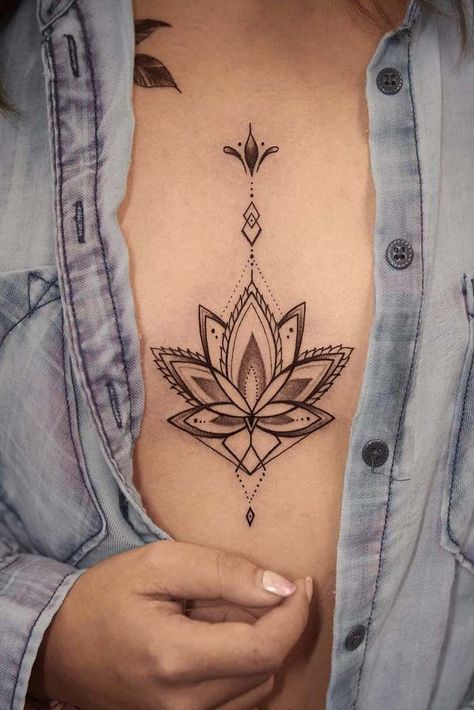 There are many variations of a lotus flower tattoo, but they all have one thing in common: they look simply wonderful. Check out our collection of the best lotus flower tattoos! #lotusflowertattoo #lotustattoo #tattoosforwomen #tattooideas Simple Lotus Flower Tattoo, Brust Tattoo Frau, Lotus Flower Tattoo Meaning, Tato Mandala, Lotusblume Tattoo, Chest Tattoo Drawings, Small Lotus Flower Tattoo, Tato Tradisional, Tato Dada