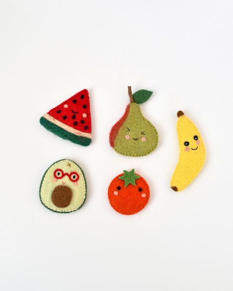 🍉 🥑 Playtime just got a whole lot juicier with our adorable Felt Fruits Finger Puppets! From a cheeky pear to an avocado with glasses, each puppet is designed to make learning about healthy eating fun and interactive. 🍐 🍅 🍌 Now available online. Swipe to see the full set in action and let us know which one’s your favourite in the comments below! #earlychildhoodeducation #fingerpuppets #interactiveplay #playingislearning #ecofriendly Puppet Stand, Clothing Keepsake, Felt Fruit, Egmont Toys, Felt Finger Puppets, Baby Gift Guide, Felt Play Food, Creative Box, Block Craft