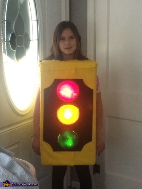 Zoe: My 10 year old daughter wanted to be a stoplight. So we covered a box in yellow felt and bought some push lights. We spray painted the lights and hot... Adult Halloween Party Ideas, Light Costume, Car Themed Parties, Hot Costume, Costume Works, Adult Halloween Party, Homemade Costumes, Halloween Costume Contest, Halloween Party Ideas