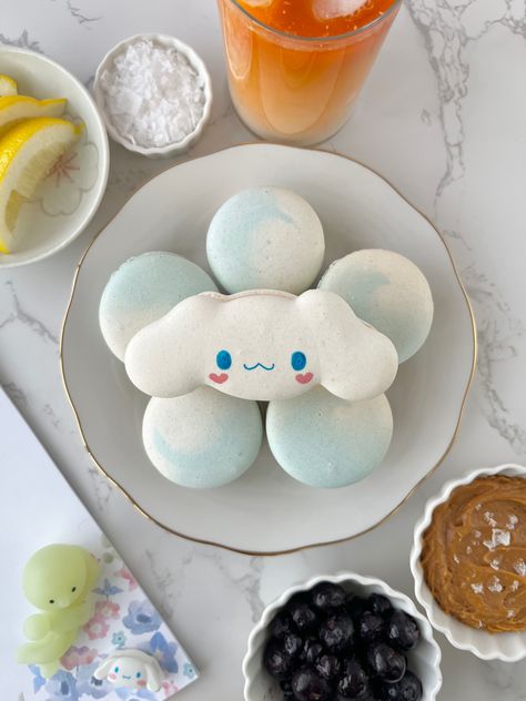 Plate of cinnamoroll sanrio character macaron and blue and white swirl macarons against a marble background. Bowls filled with blueberries, salted caramel surround the macaron plate near the bottom right. Plate of lemons, flaky salt and Thai tea located in the top left corner. Cinamoroll Cake, Lemonade Stand Party, Macaron Template, Cinnamoroll Sanrio, Food Doodles, Cake Illustration, Kawaii Dessert, Kawaii Cooking, Thai Tea