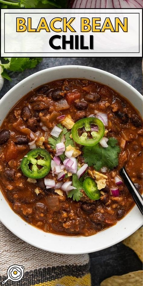 overhead photo of a bowl of black bean chili topped with red onion, jalapeños, and cilantro with recipe title block at the top. Beef Black Bean Chili, Easy Black Beans Recipe, Black Beans In Crockpot, Black Bean Chili Crockpot, Best Black Bean Chili Recipe, Vegan Black Bean Chili Recipe, Healthy Black Bean Chili, Crockpot Black Bean Soup, Crockpot Black Beans