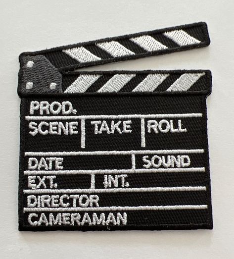 "Ready to add some movie magic to your wardrobe or accessories? Our Movie TV Television Film Clapper Iron On Patch is perfect for any film enthusiast. Measuring 3 x 2.75 inches, this embroidered patch brings the excitement of Hollywood to your fingertips. Easy to apply, long-lasting, and an amazing gift idea. Make your statement today with this one-of-a-kind patch. *Detailed Design: Clapperboard embroidery adds a touch of film industry glamour *Easy to Apply: Iron-on feature ensures quick and ha Film Clapper, Patch Pants, Pinterest Diy Crafts, Film Lovers, We Movie, Movie Buff, Iron On Applique, Patches Jacket, Film Tv