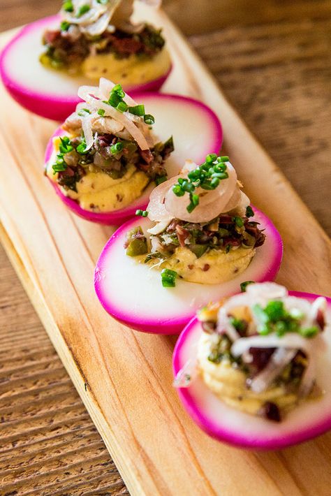 Learn how to make deviled eggs with smoked trout, pickled shallots and olives from Finch & Fork in Santa Barbara, California. Pumpkin Deviled Eggs, Jalapeno Deviled Eggs, Sriracha Deviled Eggs, Thanksgiving Deviled Eggs, Southern Deviled Eggs, Devilled Eggs Recipe Best, Nordic Recipe, Pickled Shallots, Deviled Eggs Recipe Classic