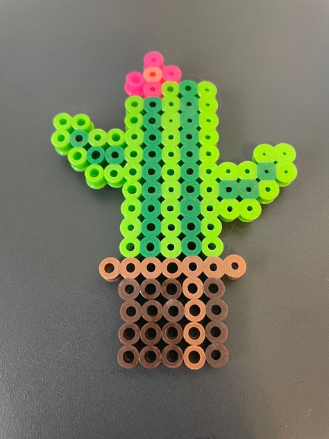 A potted cactus plant magnet made out of perler beads with a magnet on the back Perler Fridge Magnets, Perler Bead Succulent, Plant Perler Beads, Perler Beads Cactus, Perler Creations Magnets, 3d Perler Bead Plants, Cactus Plant Pots, Easy Perler Beads Ideas, Melty Beads