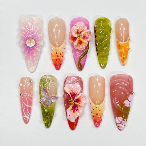 Hello, lovely!  Greetings and welcome to my store. Hope you find a style you like.  🍁 𝐌𝐚𝐭𝐞𝐫𝐢𝐚𝐥: I only work with high quality materials to create sturdy & long-lasting luxury press on nails that you can trust on. My nails will last for: 1-   2 days using adhesive tab (provided with the nail set) 2-   3 weeks using nail glue. You can reuse all of the nails multiple times if you take care of them. Follow the instructions provided with the nail set. 🍁 𝐒𝐢𝐳𝐞: XS : 15mm, 12mm, 13mm, 11mm Pastel Butterfly Nails, Calm Nail Designs, Secret Garden Nails, Fun Vacation Nails Almond Shape, Flower Designs Nails, Frangipani Nails, Garden Nails Design, Xs Almond Nails, Lotus Flower Nails