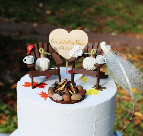 This cake topper is perfect for a 6" or 4" cake topper.  This makes for a beautiful Fall wedding. The chairs are a medium brown and Each have an orange or ivory  pumpkins in the seat.  Mugs and a campfire complete the look for a gorgeous fall topper The Bride has a layered veil with a embroidered band with a long ribbon bow. You can choose from Ivory or white veil. She has an ivory or white bouquet, you may also choose a sunflower bouquet. The Groom has a black top hat or cap on his chair. You also can choose which personalize heart you'd like.   The chairs measures  2.375 x 2.5 inches and this set is displayed on a 6" fake cake in photo.  Cake topper includes: 2 Adirondack chairs Veil and Bouquet  Top hat or cap 1 personalized heart 2 pumpkins 1 campfire 2 mugs Pumpkin Wedding Cakes, Bride Chair, Mr Heart, Fall Wedding Cake Topper, Miniature Bride, Fall Wedding Cake, Fall Barn Wedding, Pumpkin Wedding, Ivory Veil