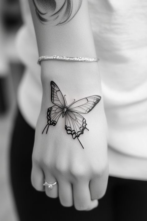 Hand with a butterfly tattoo on the back. Butterfly Tattoo Designs For Women, Realistic Butterfly Tattoo, Dynamic Tattoo, Butterfly Tattoo Ideas, 3d Butterfly Tattoo, Butterfly Outline, Butterfly Tattoos For Women, Simple Butterfly, Morpho Butterfly