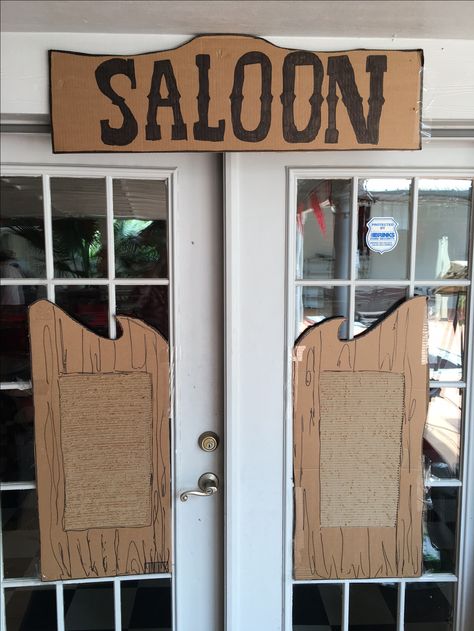 The Saloon Western Saloon Theme Party, Saloon Birthday Party, Saloon Decor Interior Design, Saloon Sign, Wild West Door Decorations, Wild West Hallway Decorations, Diy Saloon Doors Cardboard Western Theme, Deadwood Saloon Party, Saloon Signs Western