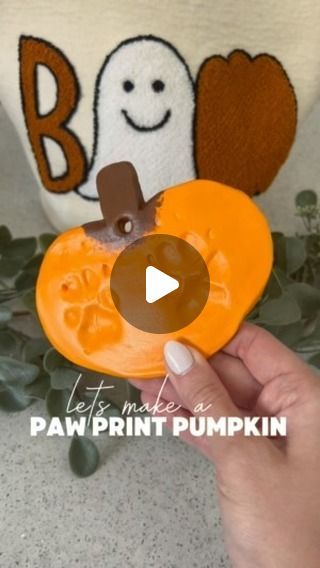 Tara Jackson on Instagram: "Let’s make a Halloween DIY Paw Print Pumpkin! 🔗 comment ‘PAW’ and I’ll send you everything you’ll need right to your inbox.

These items were significantly cheaper from Walmart. IMPORTANT **this clay is an air dry clay + needs to dry for a couple days before you can paint it!!

1. Roll the air dry clay out 
2. Shape into a pumpkin 🎃 it’s okay if it’s a little lumpy because you’re going to smooth it with the rolling pin.
3.Press your paw into the clay. (**Make sure you leave some depth so it’s not super thin and fragile when it dries)
4. Cut out a hole with a straw! You can make this an ornament! — I placed on a paper plate and hid it inside a closet for a couple days. Once the clay was dry I painted with the acrylic craft paint, I did 2 coats. & let it dry for Paw Print Pumpkin, Diy Paw Print, Fall Dog, Acrylic Craft Paint, Craft Paint, Dog Crafts, Craft Day, Halloween Craft, Dog Party