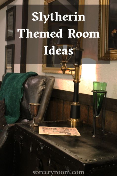 Text: Slytherin Themed Room Ideas. Black leather chair, black trunk, goblet, green glass vase, Harry Potter undesirable no 1 poster, black and brass lamp, paintings in gold frames Slytherin Aesthetic Decor, Slytherin Office Aesthetic, Slytherin Bathroom Ideas, Slytherin Aesthetic Room Decor, Slytherin Room Decor Diy, Slytherin Home Decor, Harry Potter Bedroom Ideas Slytherin, Diy Slytherin Decor, Slytherin Dorm Room Ideas