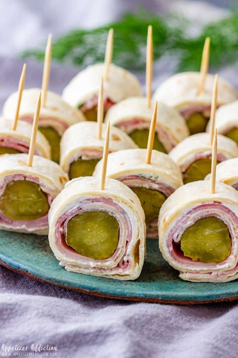 Pinwheel recipes are the perfect solution for quick party appetizers, game day snacks, potluck nibbles … even packed lunches and super-fast dinners! Most take less than 15 minutes and use common ingredients you might already have on hand. So easy! From vegetarian tortilla roll ups to chicken and cream cheese pinwheel sandwiches, tuna, salmon, tex-mex, PB&J (great for the kiddos!) … and so many more! Lots and lots of pinwheel appetizers and meals for every occasion! | www.TwoHealthyKitchens.com Ham And Pickle Roll Ups, Ham And Pickle, Pickle Roll Ups, Pick Up Food, Ham Roll Ups, Pickle Appetizers, Pinwheel Sandwiches, Cream Cheese Roll Up, Tortilla Rolls